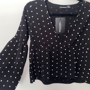Black and white polka dot crop top